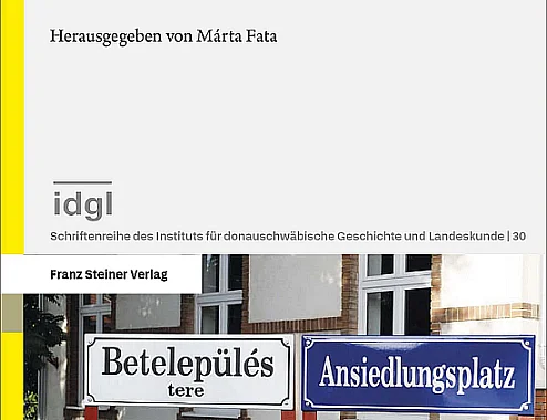 Cover of the volume: title details and two street signs—one in German, the other in Hungarian.